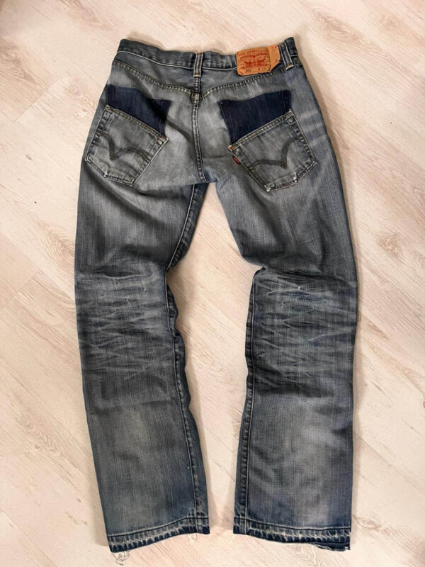 pantalon gris avec poche décaller