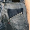 Jean Bleu avec poche décalée et flare entre les jambes